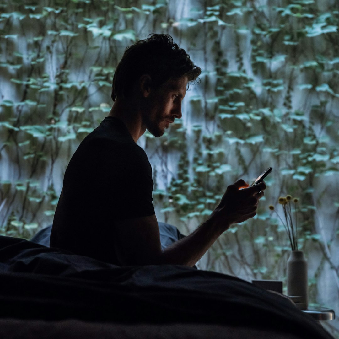 Man checking Oura app at start of his day